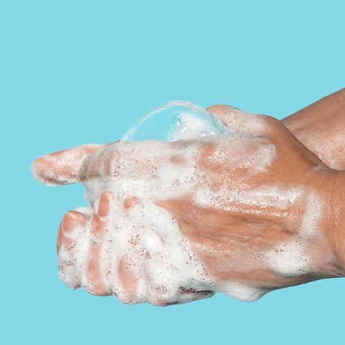 sideways person washing hands with soap (1)